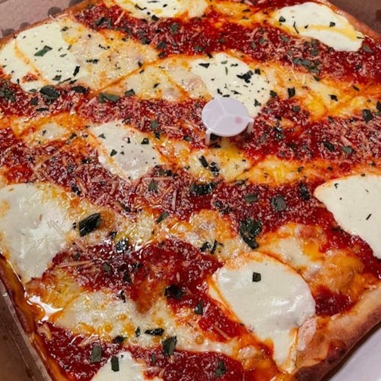 Savor Our Pizza Creations